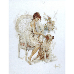 Kit Girl in chair with dog